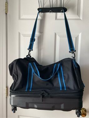 American Tourister Expandable Rolling Tote Bag Suitcase